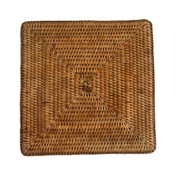 Kiko square rattan placemat in honey brown hand-woven design.