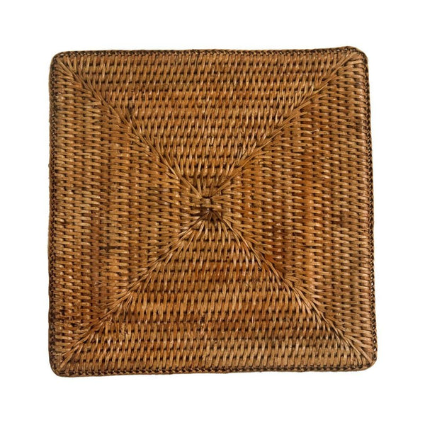 Kiko square rattan placemat in honey brown hand-woven design.