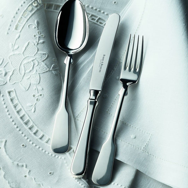 Menu spoon Spaten silver-plated next to knife and fork.