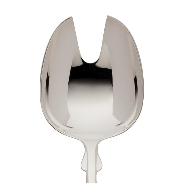 Salad serving fork large Spaten silver-plated close-up on its forked bowl.