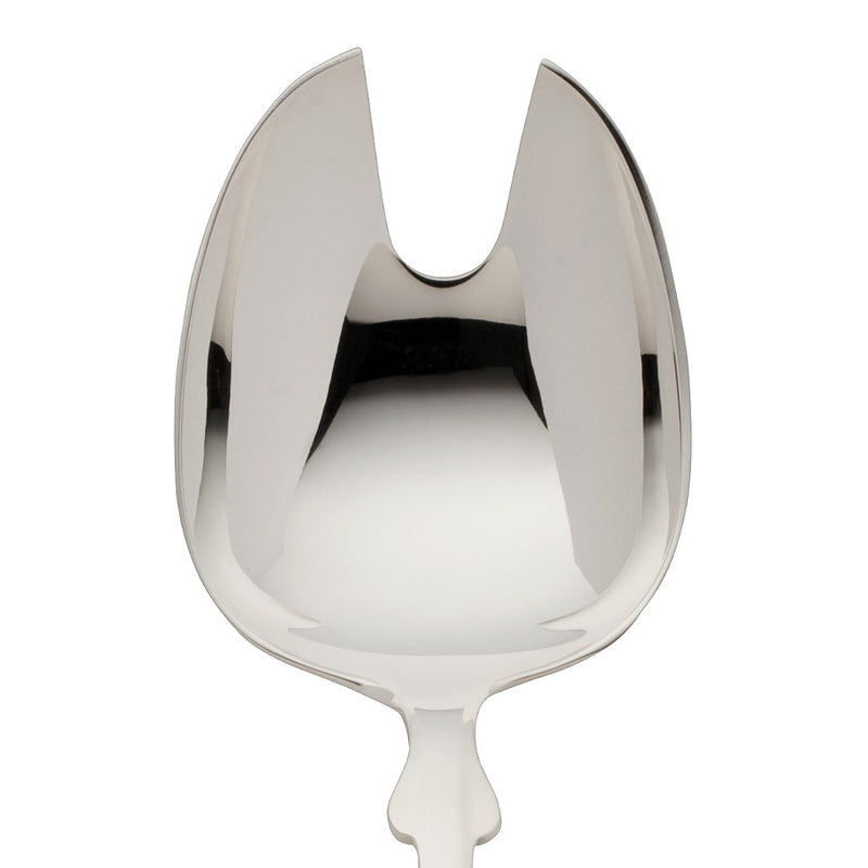 Salad serving fork small Spaten silver-plated close-up on its-forked tip.