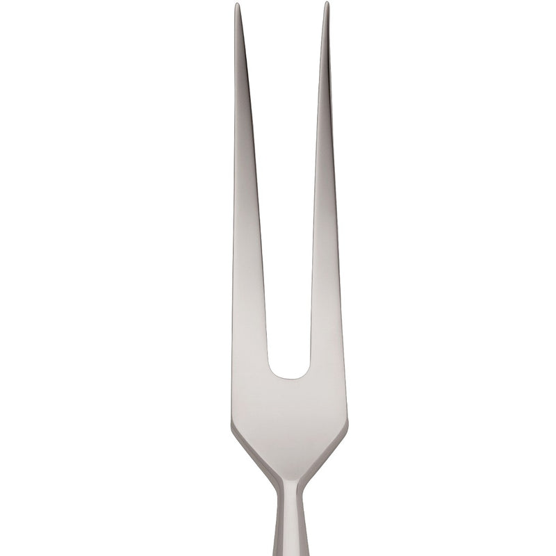 Carving fork Spaten silver-plated close-up long ointy tines.