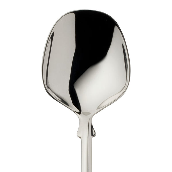 Sugar spoon Spaten silver-plated close-up on its rounded bowl.