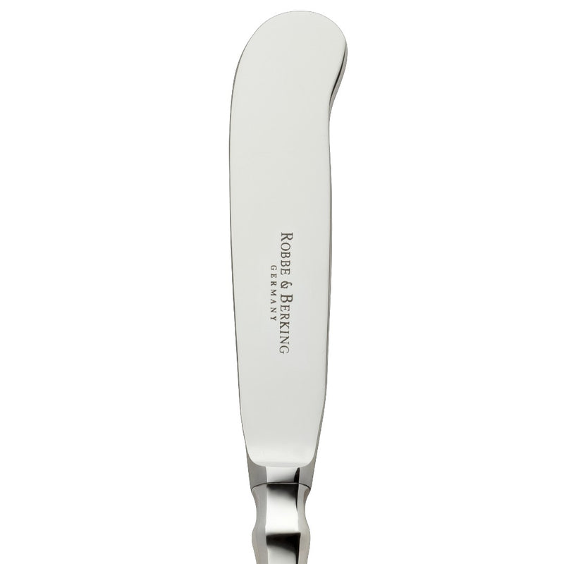 Butter knife Spaten silver-plated close-up on its rounded blade.