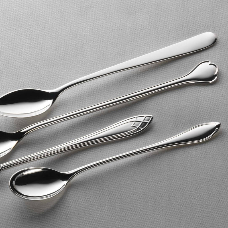 Robbe & Berking Navette silver-plated long drink spoon next to long spoons from different collections.