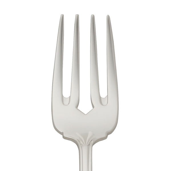 Alt Chippendale silver plated fish fork with four prongs close-up on its prongs.