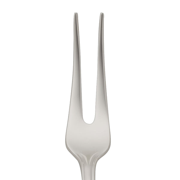 Alt Chippendale silver plated small meat fork with polished prongs close-up.