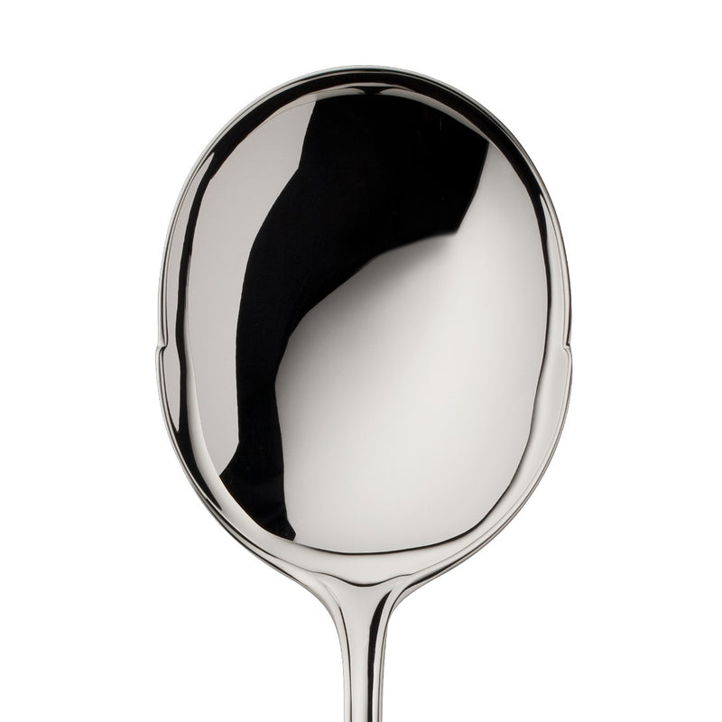 Alt Chippendale silver plated potato server close-up on it broad bowl.