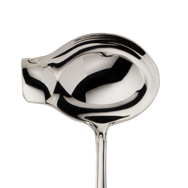 Alt Chippendale silver plated sauce ladle with deep bowl and shaped pour lip close-up.