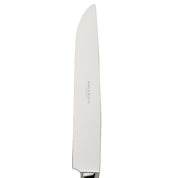 Alt Chippendale silver plated carving knife with long tapered blade close-up.
