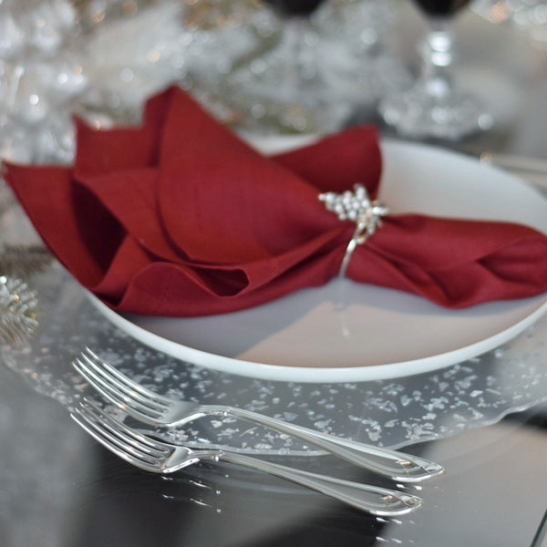 Arcade silver-plated starter and dessert fork by Robbe & Berking next to main fork on Christmas table setting.