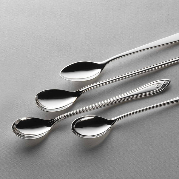Long drink spoons from Arcade collection by Robbe & Berking on white tablecloth.