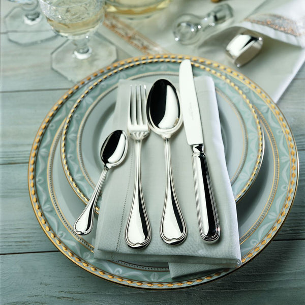 Classic-Faden silver-plated menu fork by Robbe & Berking on elegant plate next to spoon and knife.