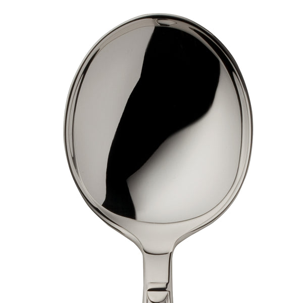 Cream spoon Art Deco silver-plated close-up on its rounded bowl