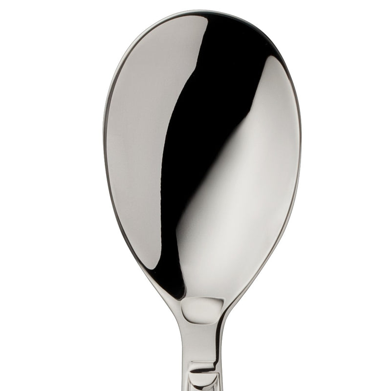 Ice cream spoon Art Deco silver-plated close-up on shallow bowl