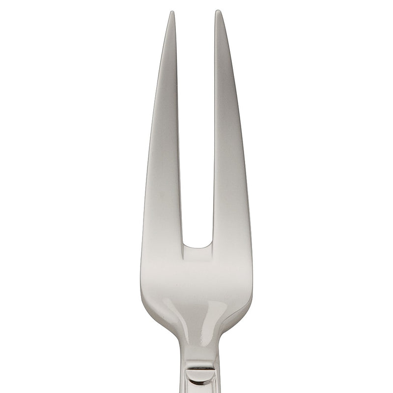 Small meat fork Art Deco silver-plated close-up on its pointy prongs