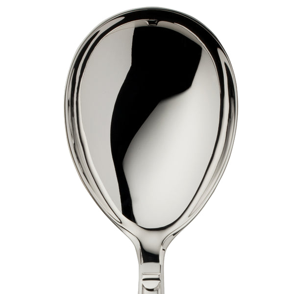 Large serving spoon Art Deco silver-plated close-up on its broad rounded bowl