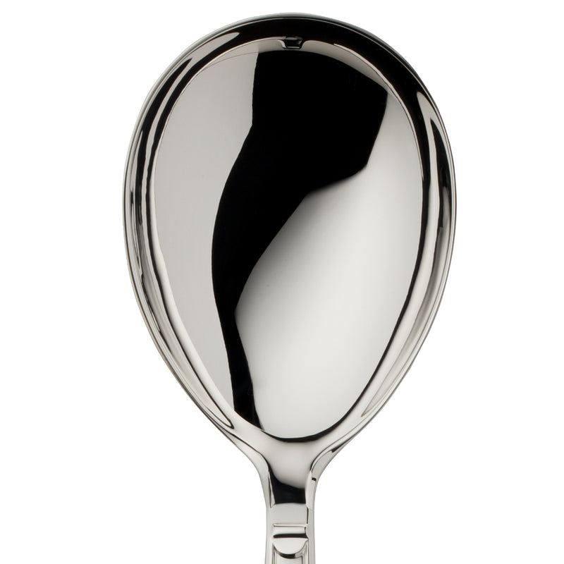 Large serving spoon Art Deco silver-plated close-up on its broad rounded bowl