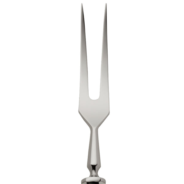Carving fork Art Deco silver-plated close-up on its two long prongs.