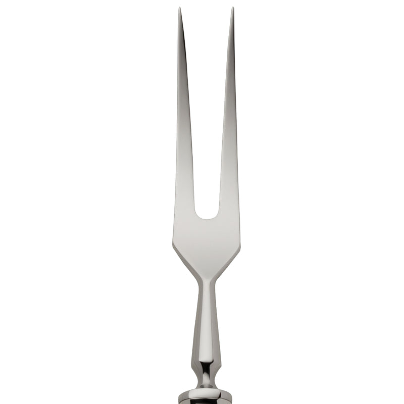 Carving fork Art Deco silver-plated close-up on its two long prongs.
