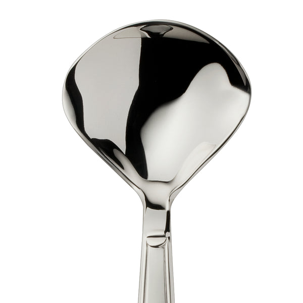 Sugar spoon Art Deco silver-plated close-up on its rounded bowl