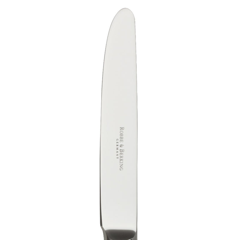 Dante silver-plated dessert knife close-up on its tapered blade