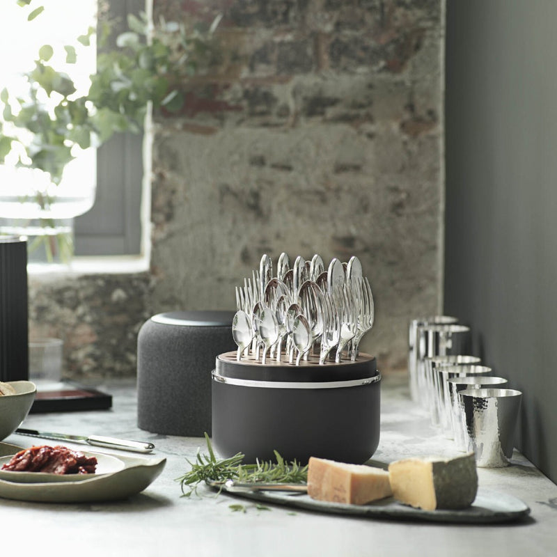 Dante silver-plated cutlery in black box with clear balanced lines styled on dining table.