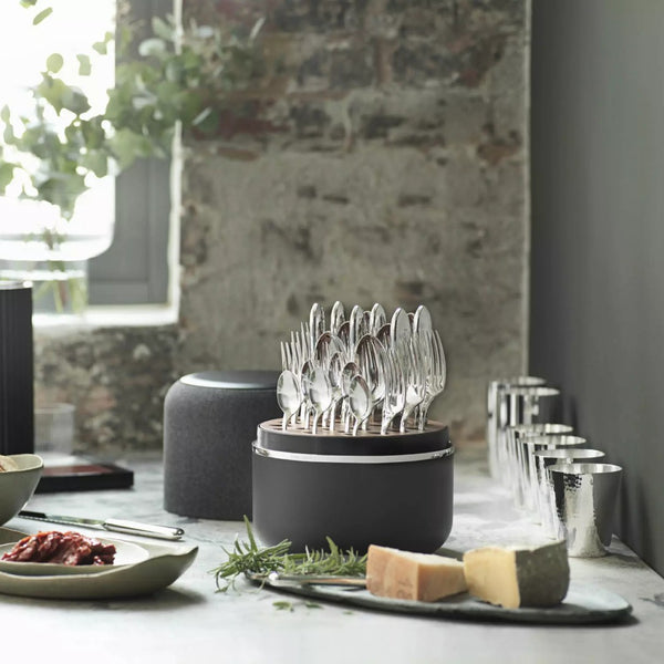 Open view of the Martelé Frozen Black Edition cutlery box on serving area.
