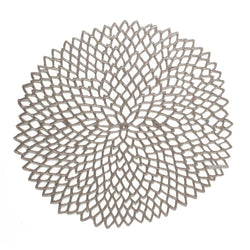 Chilewich Dahlia gunmetal round vinyl placemat with lace-cut detail.