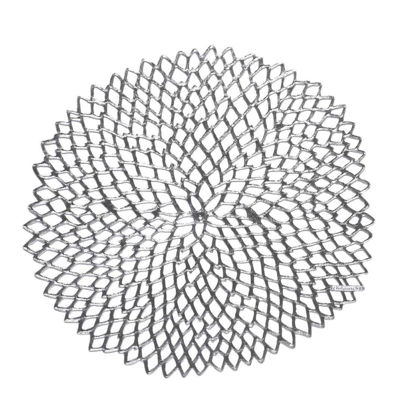 Chilewich Dahlia silver round vinyl placemat with lace-cut detail.