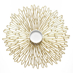 Gold Bloom round placemat with chrysanthemum openwork by Chilewich.
