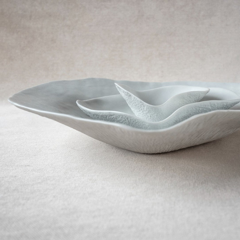 Styled stacked Shell-inspired porcelain dinner set White No2+No5+No6 Indulge Sarah-Linda