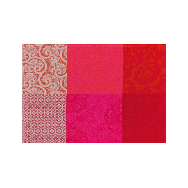 Cherry red cotton placemat with Japanese floral design by Le Jaquard Francais.