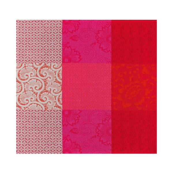 Unwraped Fleurs de Kyoto linen napkin in red by Le Jacquard Français, sold at Amiramour.