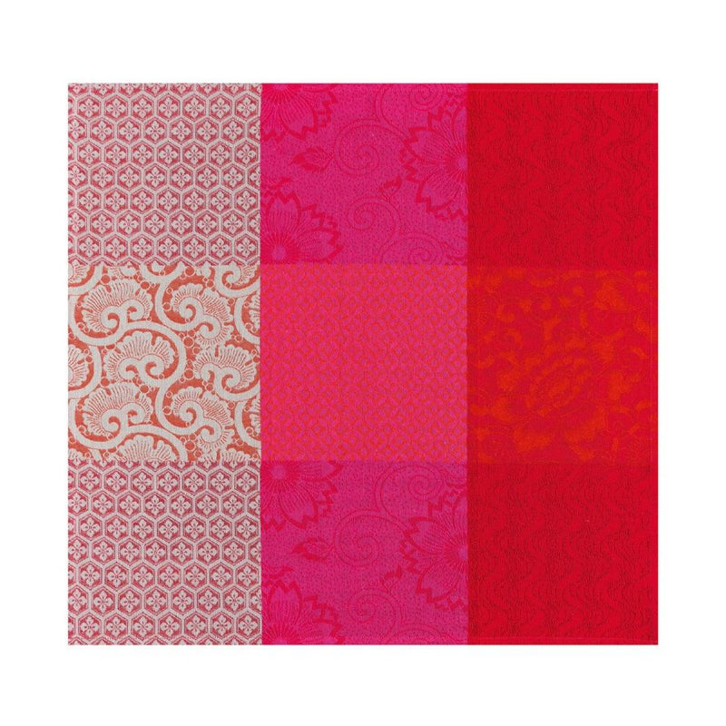 Unwraped Fleurs de Kyoto linen napkin in red by Le Jacquard Français, sold at Amiramour.