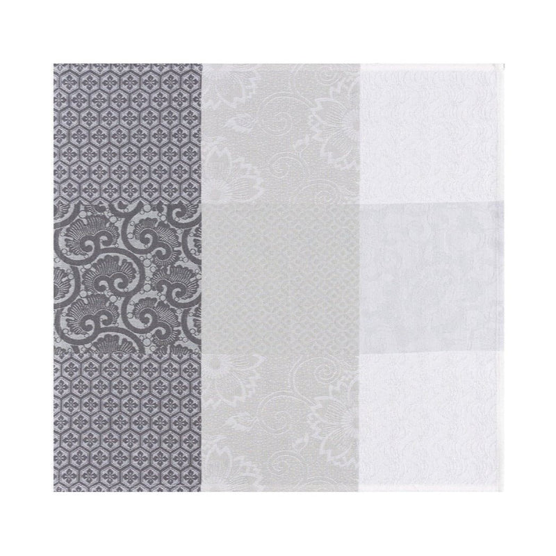 Unwraped Fleurs de Kyoto linen napkin in mist grey by Le Jacquard Français, sold at Amiramour.
