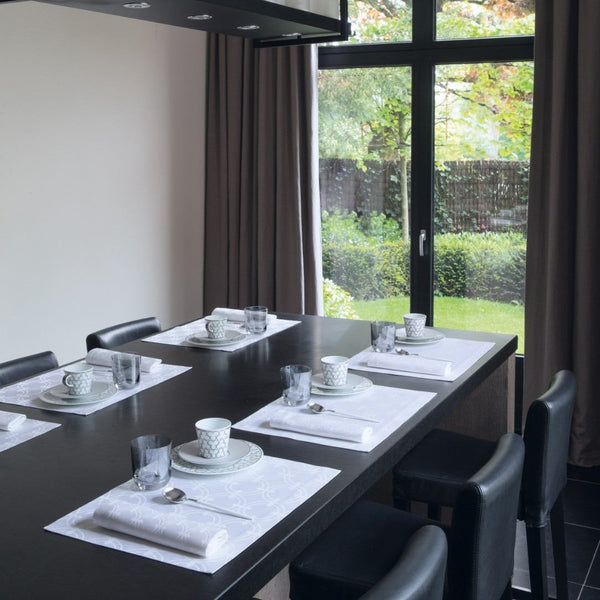 Anneaux Cotton Placemat White by Le Jacquard Français on modern luxe tablescape.