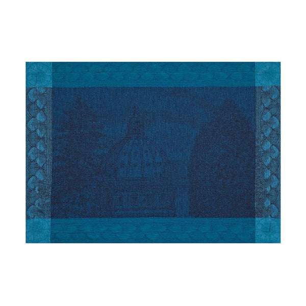 Blue linen placemat with baroque motifs by Le Jaquard Francais.