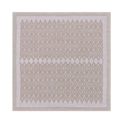 Beige cotton napkin with geometric jacquard weave by Le Jacquard Français, sold at Amiramour.