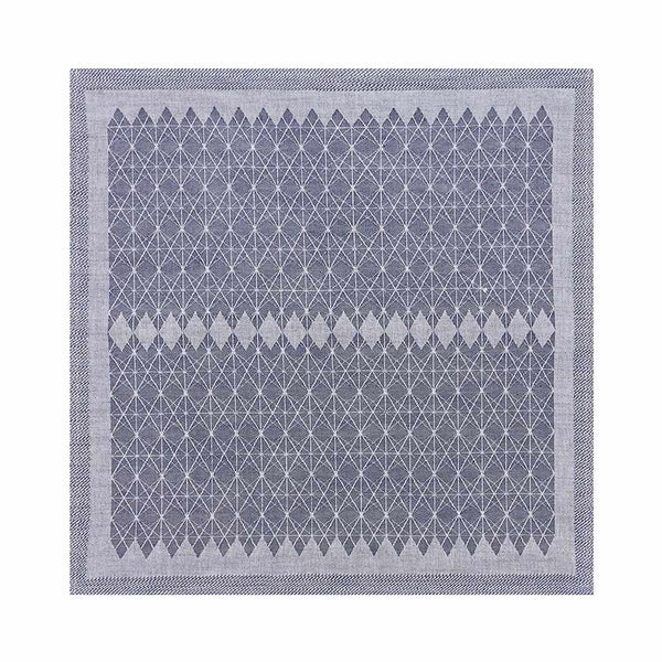 Blue cotton napkin with geometric jacquard weave by Le Jacquard Français, sold at Amiramour.