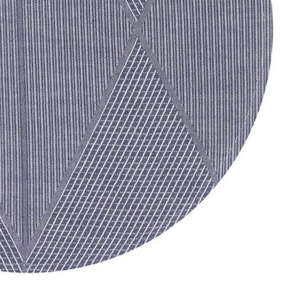 Blue cotton jacquard placemat by Le Jacquard Français with geometric design close-up.