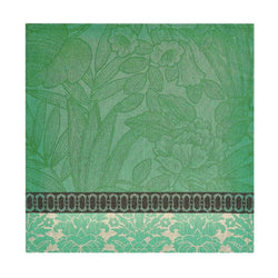 Escapade Tropicale linen napkin in green by Le Jaquard Francais unwraped on white background.