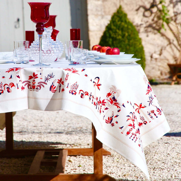 a table with a tablecloth and glasses