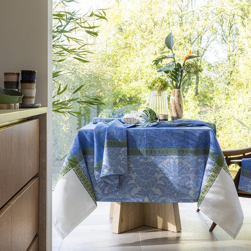 'Escapade Tropicale' Linen Tablecloth in Blue by Le Jacquard Français