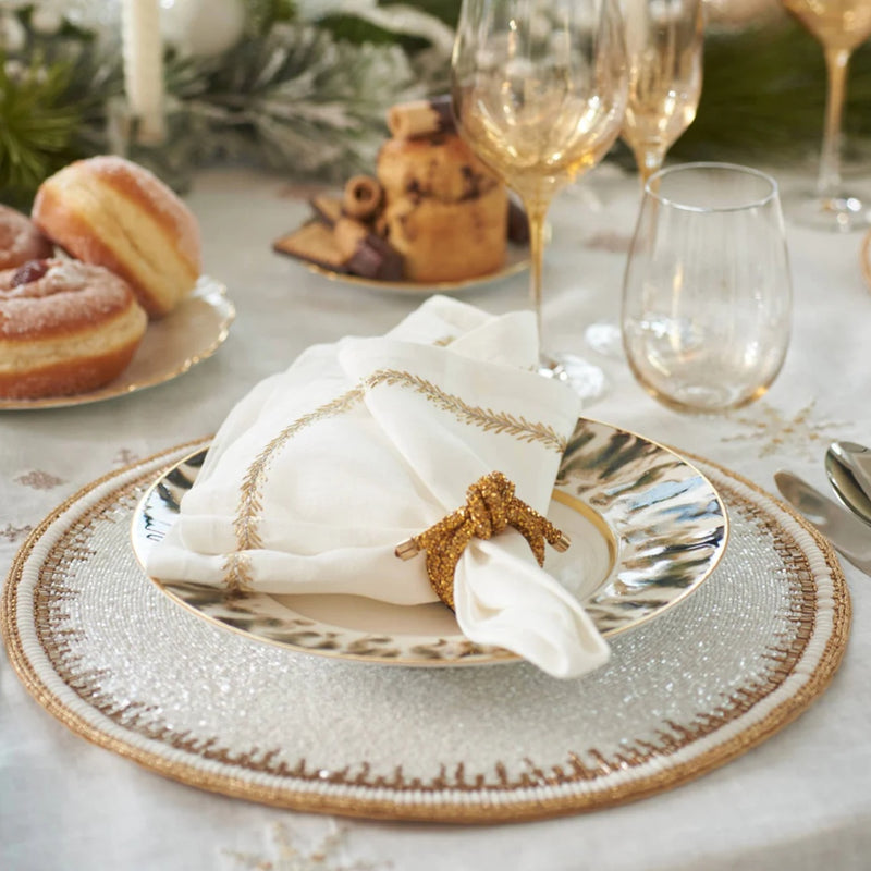 Side view of Jardin linen napkin styled on table setting by Amiramour
