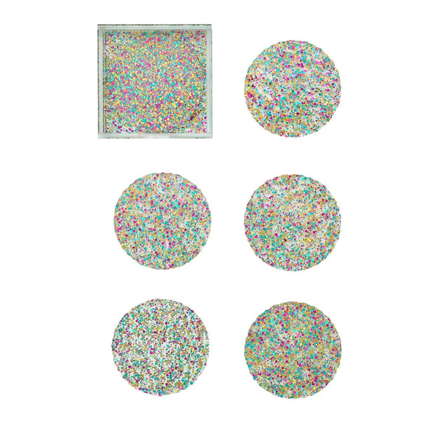 Set of multicolored coasters with a confetti-like pattern. They come in a set of six and include a caddy where they can be placed.