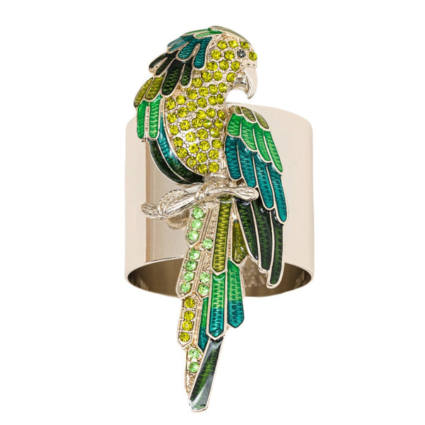 Close-up of parrot napkin ring on white background.