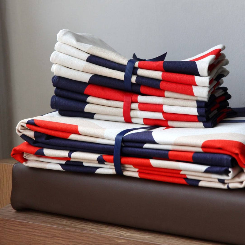 Set of 4 Alto Duo Bubble Ecru napkins, stacked on top of each other.