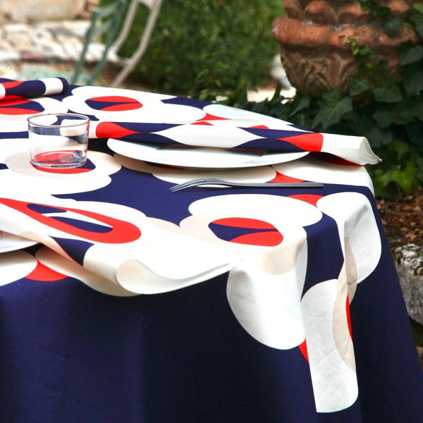 Alto Duo ecru luxury napkin folded on white plate.