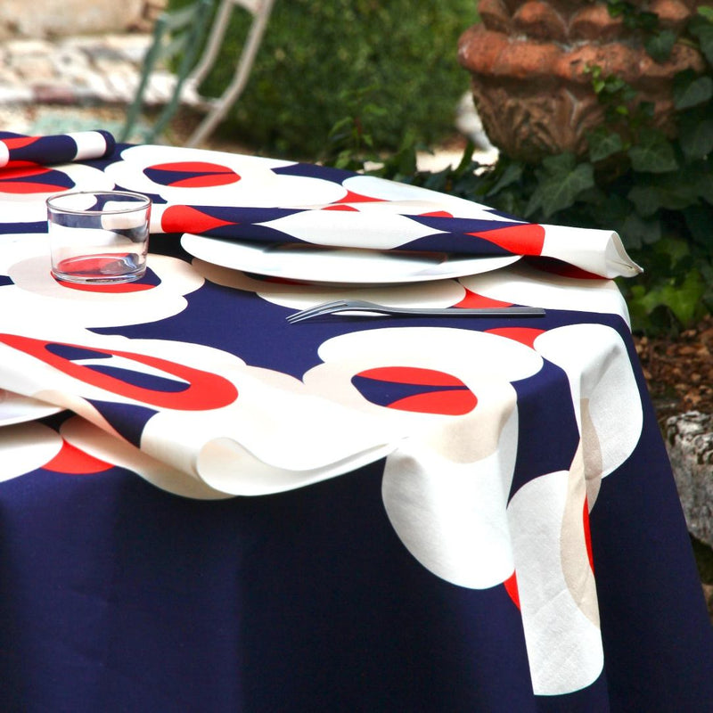 Alto Duo ecru luxury napkin folded on white plate.